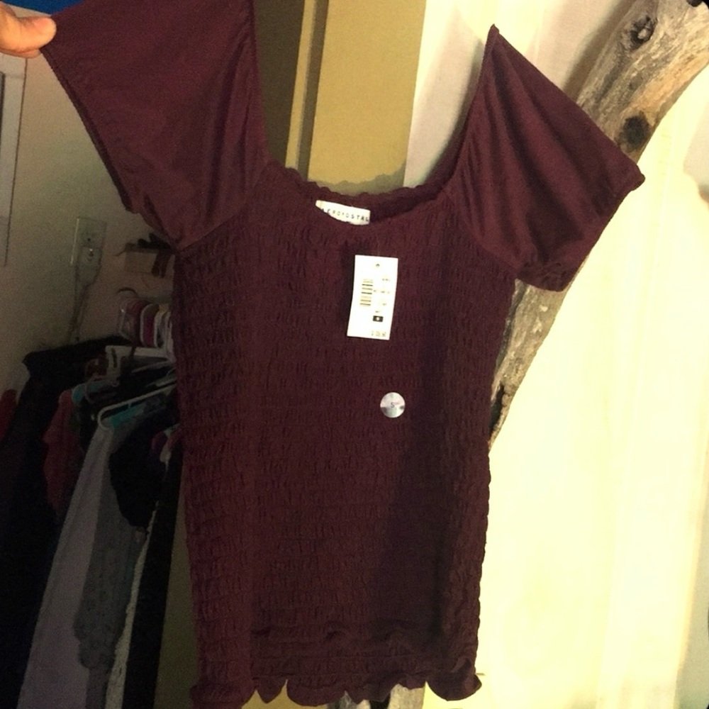 Deep Maroon. Fully Smocked, Waffle Hem, Closed Bell Sleeve Top